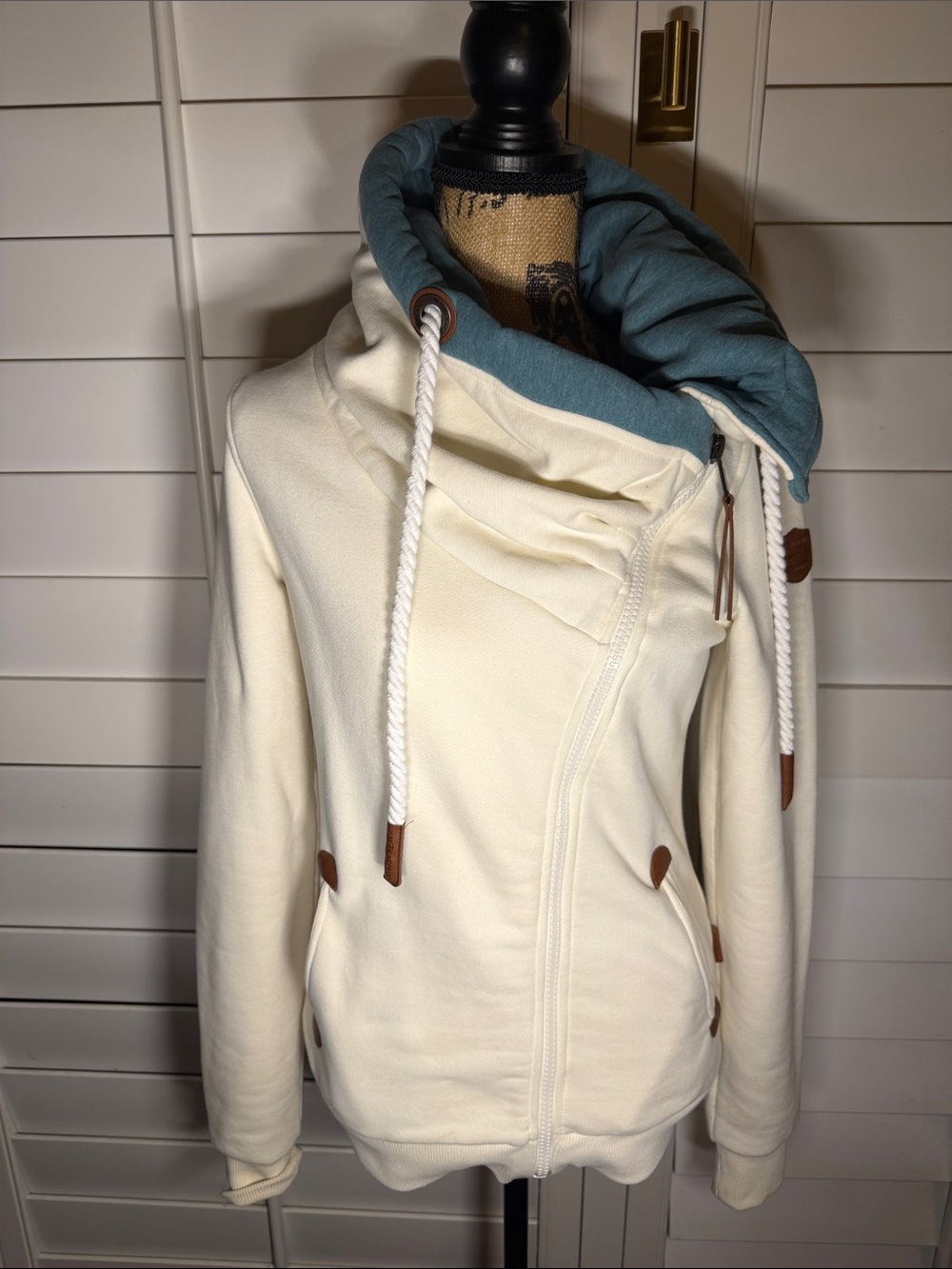 Wanakome Cream Jacket with Teal Hood